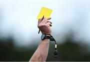 6 August 2022; Referee Darren Delaney shows a yellow card during the Dublin County Senior Club Football Championship Group 1 match between Kilmacud Crokes and Raheny at Parnell Park in Dublin. Photo by Piaras Ó Mídheach/Sportsfile