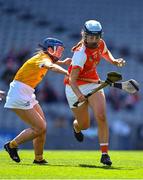 7 August 2022; Sinead Quinn of Armagh in action against Maria McLarnon of Antrim during the Glen Dimplex All-Ireland Premier Junior Camogie Championship Final match between Antrim and Armagh at Croke Park in Dublin. Photo by Seb Daly/Sportsfile