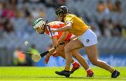 7 August 2022; Corina Doyle of Armagh in action against Enya McShane of Antrim during the Glen Dimplex All-Ireland Premier Junior Camogie Championship Final match between Antrim and Armagh at Croke Park in Dublin. Photo by Seb Daly/Sportsfile