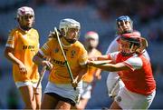 7 August 2022; Dervla Cosgrove of Antrim in action against Nicola Woods of Armagh during the Glen Dimplex All-Ireland Premier Junior Camogie Championship Final match between Antrim and Armagh at Croke Park in Dublin. Photo by Piaras Ó Mídheach/Sportsfile