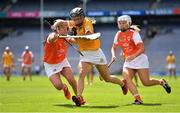 7 August 2022; Fionnuala Kelly of Antrim in action against Michelle McArdle of Armagh, left, during the Glen Dimplex All-Ireland Premier Junior Camogie Championship Final match between Antrim and Armagh at Croke Park in Dublin. Photo by Seb Daly/Sportsfile