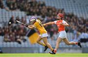 7 August 2022; Anna McNeill of Antrim in action against Leanne Donnelly of Armagh during the Glen Dimplex All-Ireland Premier Junior Camogie Championship Final match between Antrim and Armagh at Croke Park in Dublin. Photo by Seb Daly/Sportsfile