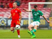 6 August 2022; Luke Casey of Republic of Ireland in action against Rhys Alan Williams of Wales during the Amateur International match between Republic of Ireland and Wales at Turner's Cross in Cork. Photo by Michael P Ryan/Sportsfile