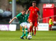 6 August 2022; Jimmy Carr of Republic of Ireland in action against Sam Downey of Wales during the Amateur International match between Republic of Ireland and Wales at Turner's Cross in Cork. Photo by Michael P Ryan/Sportsfile