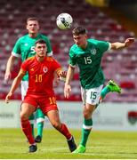 6 August 2022; Luke Casey of Republic of Ireland in action against Matty Hill of Wales during the Amateur International match between Republic of Ireland and Wales at Turner's Cross in Cork. Photo by Michael P Ryan/Sportsfile