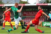 6 August 2022; Derek Hyland of Republic of Ireland in action against Christopher Cathrall of Wales during the Amateur International match between Republic of Ireland and Wales at Turner's Cross in Cork. Photo by Michael P Ryan/Sportsfile