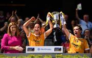 7 August 2022; Antrim captains Maria McLarnon, left, and Emma Laverty lift the Kathleen Mills Cup after their side's victory in the Glen Dimplex All-Ireland Premier Junior Camogie Championship Final match between Antrim and Armagh at Croke Park in Dublin. Photo by Seb Daly/Sportsfile