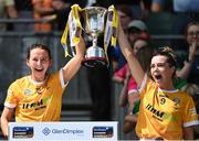 7 August 2022; Maria McLarnon, left, and Emma Laverty of Antrim lift the Kathleen Mills Cup after their side's victory in the Glen Dimplex All-Ireland Premier Junior Camogie Championship Final match between Antrim and Armagh at Croke Park in Dublin. Photo by Piaras Ó Mídheach/Sportsfile