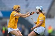 7 August 2022; Orlagh Laverty, left, and Dervla Cosgrove of Antrim celebrate after their side's victory in the Glen Dimplex All-Ireland Premier Junior Camogie Championship Final match between Antrim and Armagh at Croke Park in Dublin. Photo by Seb Daly/Sportsfile