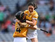 7 August 2022; Antrim players Lisa McConville, right, and Enya McShane celebrate after their side's victory in the Glen Dimplex All-Ireland Premier Junior Camogie Championship Final match between Antrim and Armagh at Croke Park in Dublin. Photo by Piaras Ó Mídheach/Sportsfile