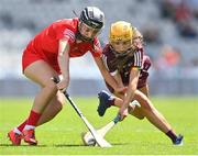 7 August 2022; Grainne Hannon of Cork in action against Niamh McInerney of Galway during the Glen Dimplex All-Ireland Intermediate Camogie Championship Final match between Cork and Galway at Croke Park in Dublin. Photo by Seb Daly/Sportsfile