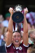 7 August 2022; Galway captain Lisa Casserly lfits Jack McGrath Cup after her side's victory in the Glen Dimplex All-Ireland Intermediate Camogie Championship Final match between Cork and Galway at Croke Park in Dublin. Photo by Piaras Ó Mídheach/Sportsfile