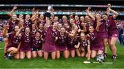 7 August 2022; Galway players celebrates with the Jack McGrath Cup after their side's victory in the Glen Dimplex All-Ireland Intermediate Camogie Championship Final match between Cork and Galway at Croke Park in Dublin. Photo by Seb Daly/Sportsfile