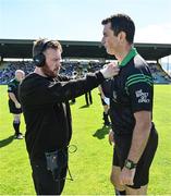 7 August 2022; TG4 sound engineer Oisin O'Driscoll puts a microphone on referee John O'Halloran before the Kerry County Senior Hurling Championship Final match between Ballyduff and Causeway at Austin Stack Park in Tralee, Kerry. Photo by Brendan Moran/Sportsfile