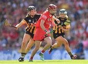 7 August 2022; Katrina Mackey of Cork in action against Claire Phelan, left, and Michelle Teehan of Kilkenny during the Glen Dimplex All-Ireland Senior Camogie Championship Final match between Cork and Kilkenny at Croke Park in Dublin. Photo by Seb Daly/Sportsfile