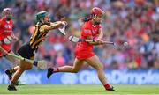 7 August 2022; Fiona Keating of Cork shoots to score her side's first goal, despite pressure from Kilkenny Michelle Teehan, during the Glen Dimplex All-Ireland Senior Camogie Championship Final match between Cork and Kilkenny at Croke Park in Dublin. Photo by Seb Daly/Sportsfile