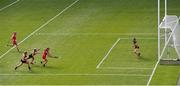 7 August 2022; Fiona Keating of Cork shoots to score her side's first goal, despite pressure from Kilkenny Michelle Teehan, during the Glen Dimplex All-Ireland Senior Camogie Championship Final match between Cork and Kilkenny at Croke Park in Dublin. Photo by Seb Daly/Sportsfile