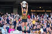 7 August 2022; Katie Power of Kilkenny lifts the O'Duffy Cup after her side's victory in the Glen Dimplex All-Ireland Senior Camogie Championship Final match between Cork and Kilkenny at Croke Park in Dublin. Photo by Seb Daly/Sportsfile