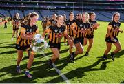 7 August 2022; Kilkenny captain Aoife Prendergast, left, celebrates with the O'Duffy Cup and her teammates after their side's victory in the Glen Dimplex All-Ireland Senior Camogie Championship Final match between Cork and Kilkenny at Croke Park in Dublin. Photo by Seb Daly/Sportsfile