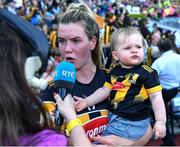 7 August 2022; Kilkenny captain Aoife Prendergast and her niece Indie during an RTÉ radio interview after her side's victory in the Glen Dimplex All-Ireland Senior Camogie Championship Final match between Cork and Kilkenny at Croke Park in Dublin. Photo by Piaras Ó Mídheach/Sportsfile