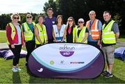 8 August 2022; Vhi ambassador and Olympian David Gillick with volunteers at Tymon parkrun where Vhi hosted a special event to celebrate their More Than Running campaign. Vhi ambassador and Olympian David Gillick was on hand to lead the warm up for parkrun participants and is calling on people to attend a parkrun near you this summer and build it into their weekly routines by either walking, jogging, running or volunteering. parkruns have proved to improve participants fitness levels, along with physical heath, happiness and mental health. parkrun in partnership with Vhi support local communities in organising free, weekly, timed 5km runs every Saturday at 9.30am. To register for a parkrun near you visit www.parkrun.ie.  Photo by Seb Daly/Sportsfile