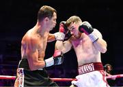 6 August 2022; Kieran Molloy, right, and Evgenii Vazem during their super-welterweight bout at SSE Arena in Belfast. Photo by Ramsey Cardy/Sportsfile