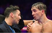 6 August 2022; Michael Conlan, right, with his brother Jamie after his featherweight bout against Miguel Marriaga at SSE Arena in Belfast. Photo by Ramsey Cardy/Sportsfile
