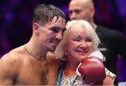 6 August 2022; Michael Conlan, with his mother Teresa, after defeating Miguel Marriaga in their featherweight bout at SSE Arena in Belfast. Photo by Ramsey Cardy/Sportsfile