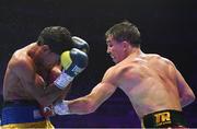 6 August 2022; Michael Conlan, right, and Miguel Marriaga during their featherweight bout at SSE Arena in Belfast. Photo by Ramsey Cardy/Sportsfile