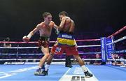 6 August 2022; Michael Conlan, left, and Miguel Marriaga during their featherweight bout at SSE Arena in Belfast. Photo by Ramsey Cardy/Sportsfile