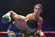 6 August 2022; Michael Conlan, right, and Miguel Marriaga during their featherweight bout at SSE Arena in Belfast. Photo by Ramsey Cardy/Sportsfile