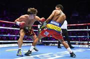 6 August 2022; Michael Conlan, left, and Miguel Marriaga during their featherweight bout at SSE Arena in Belfast. Photo by Ramsey Cardy/Sportsfile