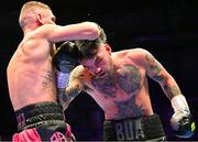 6 August 2022; Tyrone McKenna, right, and Chris Jenkins during their welterweight bout at SSE Arena in Belfast. Photo by Ramsey Cardy/Sportsfile