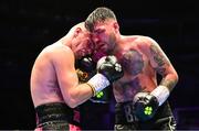 6 August 2022; Tyrone McKenna, right, and Chris Jenkins during their welterweight bout at SSE Arena in Belfast. Photo by Ramsey Cardy/Sportsfile