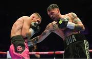 6 August 2022; Tyrone McKenna, right, and Chris Jenkins during their welterweight bout at SSE Arena in Belfast. Photo by Ramsey Cardy/Sportsfile