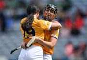 7 August 2022; Antrim players Enya McShane, right, and Lisa McConville celebrate after their side's victory in the Glen Dimplex All-Ireland Premier Junior Camogie Championship Final match between Antrim and Armagh at Croke Park in Dublin. Photo by Piaras Ó Mídheach/Sportsfile
