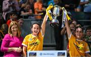 7 August 2022; Maria McLarnon, left, and Emma Laverty of Antrim lift the Kathleen Mills Cup after their side's victory in the Glen Dimplex All-Ireland Premier Junior Camogie Championship Final match between Antrim and Armagh at Croke Park in Dublin. Photo by Piaras Ó Mídheach/Sportsfile