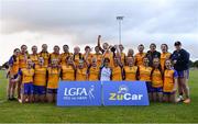 3 August 2022; Clare players celebrate after their side's victory in the ZuCar All-Ireland Ladies Football Minor ‘C’ Championship Final match between Clare and Wicklow at Kinnegad GAA club in Kinnegad, Westmeath. Photo by Piaras Ó Mídheach/Sportsfile