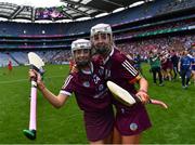 7 August 2022; Galway players Cora Kenny, left, and Olwen Rabbitte celebrate after their side's victory in the Glen Dimplex All-Ireland Intermediate Camogie Championship Final match between Cork and Galway at Croke Park in Dublin. Photo by Piaras Ó Mídheach/Sportsfile