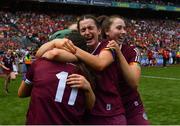 7 August 2022; Galway players, including Tegan Canning, centre, celebrate after their side's victory in the Glen Dimplex All-Ireland Intermediate Camogie Championship Final match between Cork and Galway at Croke Park in Dublin. Photo by Piaras Ó Mídheach/Sportsfile