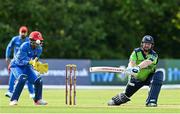 9 August 2022; Paul Stirling of Ireland and Afghanistan wicketkeeper Rahmanullah Gurbaz during the Men's T20 International match between Ireland and Afghanistan at Stormont in Belfast. Photo by Ramsey Cardy/Sportsfile