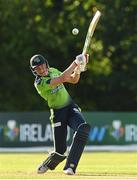 9 August 2022; Harry Tector of Ireland hits a four during the Men's T20 International match between Ireland and Afghanistan at Stormont in Belfast. Photo by Ramsey Cardy/Sportsfile