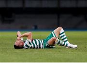 9 August 2022; Aaron Greene of Shamrock Rovers goes down injured during the UEFA Europa League third qualifying round second leg match between Shkupi and Shamrock Rovers at Arena Todor Proeski in Skopje, North Macedonia. Photo by Ognen Teofilovski/Sportsfile