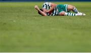 9 August 2022; Aaron Greene of Shamrock Rovers goes down injured during the UEFA Europa League third qualifying round second leg match between Shkupi and Shamrock Rovers at Arena Todor Proeski in Skopje, North Macedonia. Photo by Ognen Teofilovski/Sportsfile