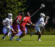 10 August 2022; Jake Naso of USA in action against Casey Wilson of Canada during the 2022 World Lacrosse Men's U21 World Championship - Group A match between USA and Canada at the University of Limerick in Limerick. Photo by Tom Beary/Sportsfile