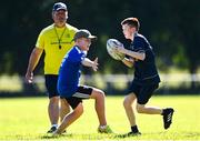 11 August 2022; Ethan Caughlan, right, during the Bank of Ireland Leinster Rugby Summer Camp at Newbridge RFC in Kildare. Photo by Harry Murphy/Sportsfile