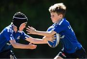 11 August 2022; Rian Byrne, right, during the Bank of Ireland Leinster Rugby Summer Camp at Tallaght RFC in Dublin. Photo by Harry Murphy/Sportsfile