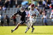 11 August 2022; Jack Allen of England is tackled by Patrick Kavanagh of USA during the 2022 World Lacrosse Men's U21 World Championship - Group A match between USA and England at the University of Limerick in Limerick. Photo by Tom Beary/Sportsfile