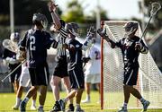 11 August 2022; Graham Bundy, JR. of USA, centre, celebrates after scoring a goal with Christopher Kirst, right, and Cole Kirst of USA during the 2022 World Lacrosse Men's U21 World Championship - Group A match between USA and England at the University of Limerick in Limerick. Photo by Tom Beary/Sportsfile