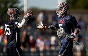 11 August 2022; Graham Bundy, JR., right, celebrates after scoring a goal with Alex Slusher of USA during the 2022 World Lacrosse Men's U21 World Championship - Group A match between USA and England at the University of Limerick in Limerick. Photo by Tom Beary/Sportsfile